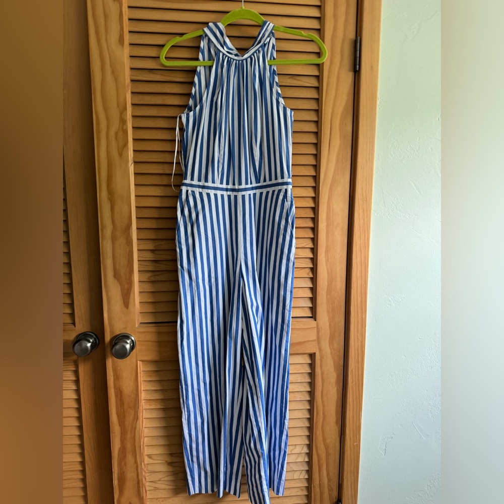 Blue and white striped romper with bow at neck